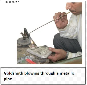 Goldsmith blowing through a metallic pipe 